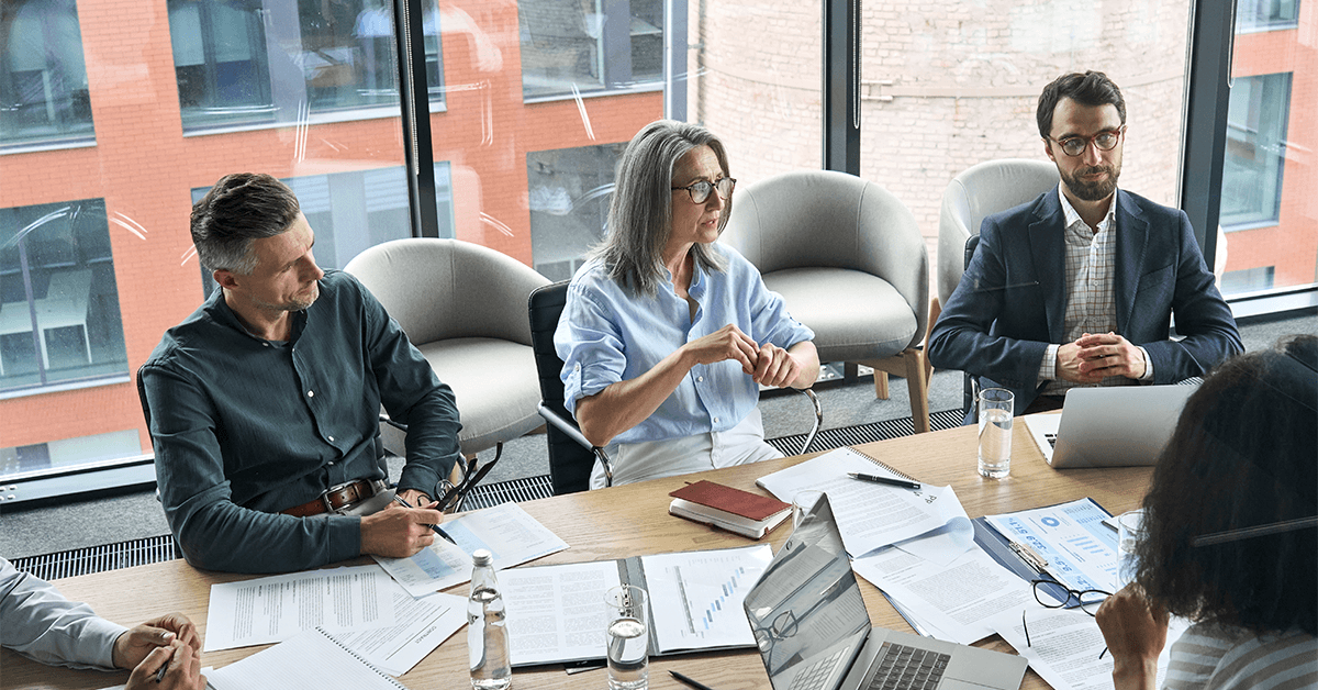Government contractors having a meeting